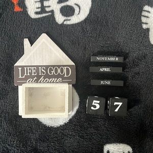 white,black,and grey house calendar